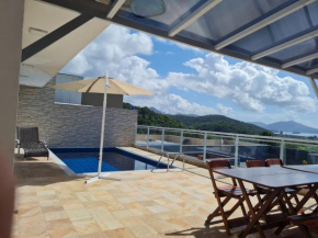 Casa Vista pro mar e piscina em caraguatatuba